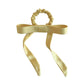 Gifty satin yellow ribbon bow scrunchie styled in blonde hair ponytail