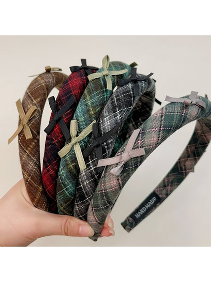 Close-up of Gifty plaid bow headband fabric texture and pattern
