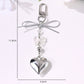 Close-up of Keypus bow keychain showing detailed star and heart shapes