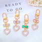 Close-up of a cute beaded heart keychain with pastel-colored beads