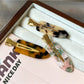 Beau acetate invisible hair clip held in hand to show size and transparency