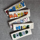Gifty - Letter Pattern Sports Headband
