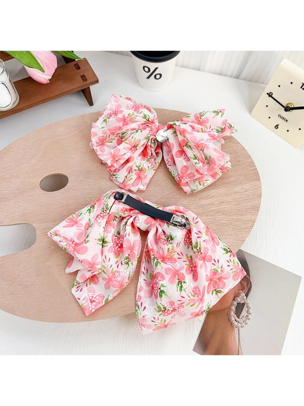Close-up of red floral bow scrunchie fabric texture