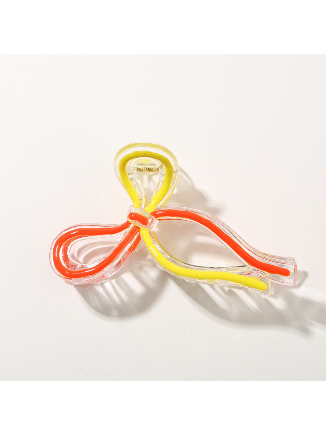 Top view of Beau Sweet Ribbon Knot Hair Clip showing symmetrical ribbon knot design