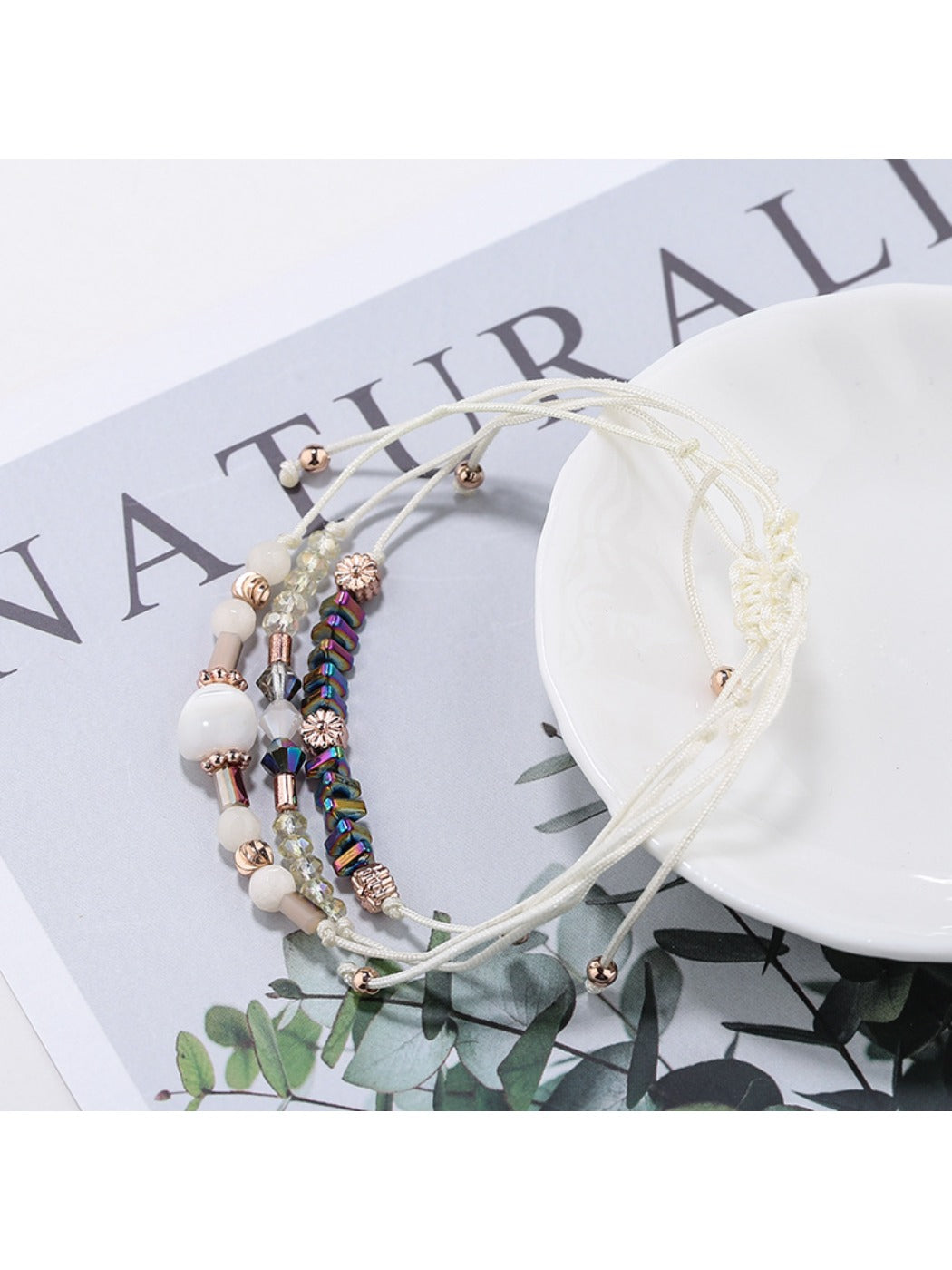 Side view of Lovra beaded woven cord bracelet highlighting bead arrangement