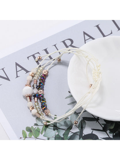 Side view of Lovra beaded woven cord bracelet highlighting bead arrangement