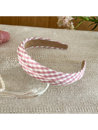 Side view of Gifty headband featuring minimalist plaid and stripe pattern