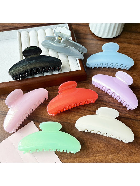 Beau stylish half round hair clip in matte black on white background