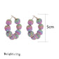 Earedge vintage raffia round ball drop earrings displayed hanging on a stand