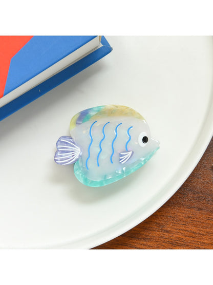 Beau tropical fish hair clip styled in model's hair showcasing accessory use
