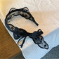 Gifty lace headband with tulle bow styled with casual outfit