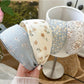 Sweet countryside style headband with floral pattern on a white background
