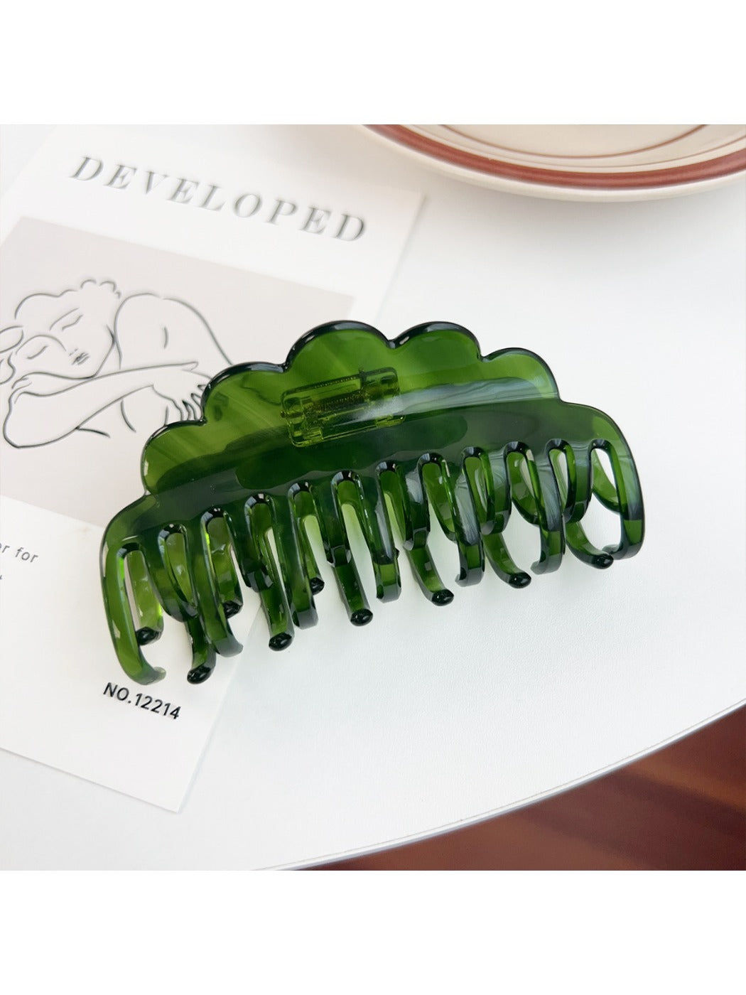 Beau double row wavy claw clip open showing spring mechanism
