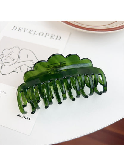 Beau double row wavy claw clip open showing spring mechanism