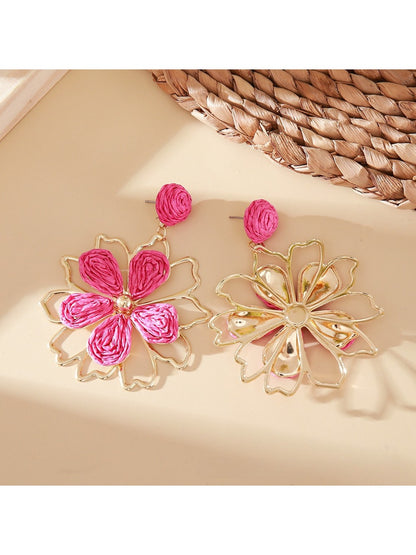Side view of Earedge flower shaped drop earrings showing the drop length