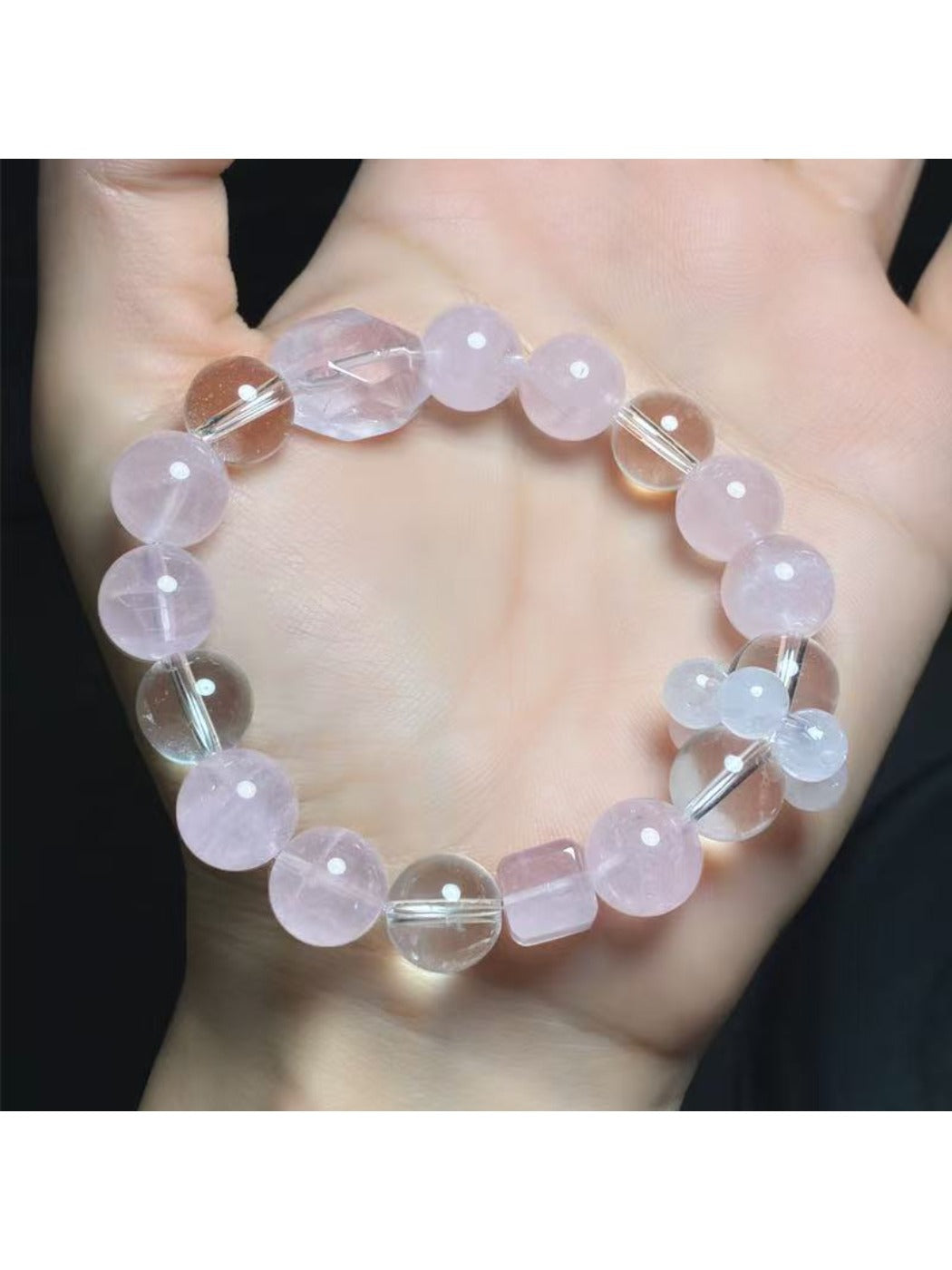 Lovra bracelet styled with casual outfit, highlighting its minimalist pink beads and gold accents
