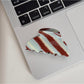 Beau Retro Twill Acetate Clip displayed on a wooden surface with natural light