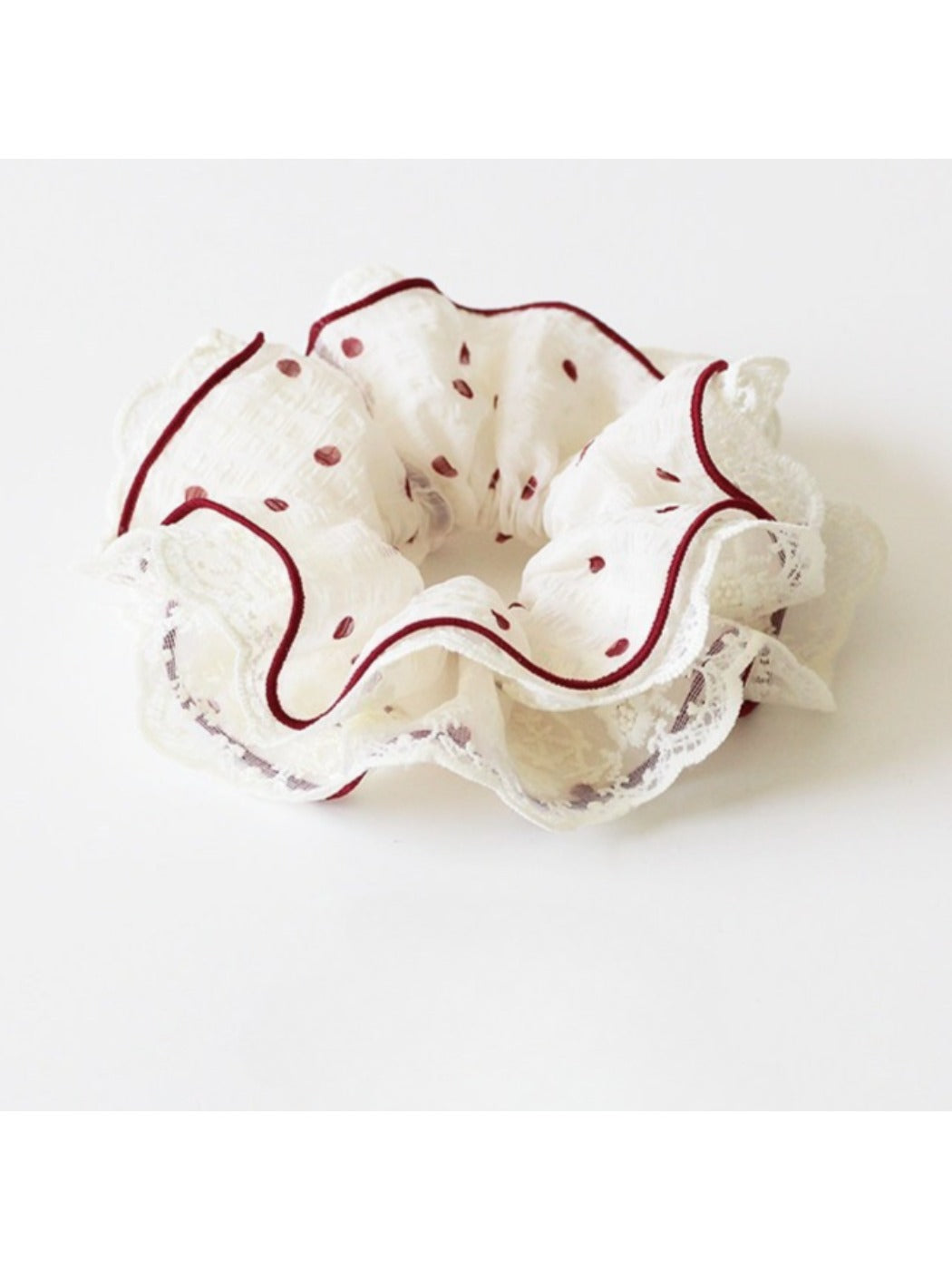 Gifty vintage polka dot scrunchie displayed on a white background