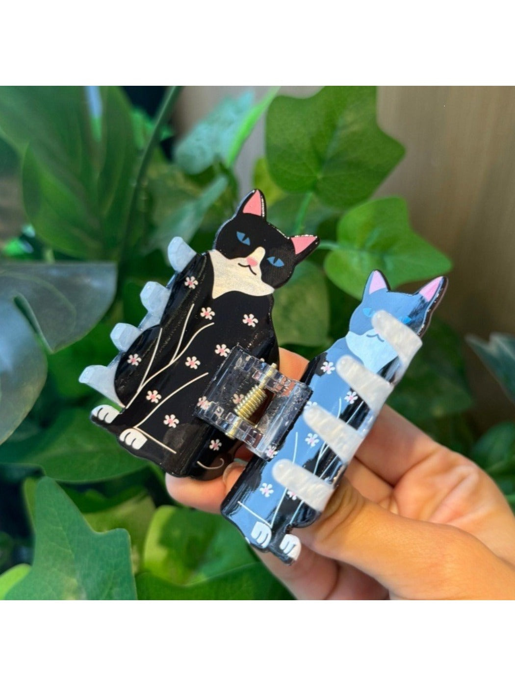 Side view of Beau cat shaped hair clip showing clip mechanism and cat ears