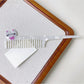 Camerow acetate hair comb displayed alongside hair styling accessories
