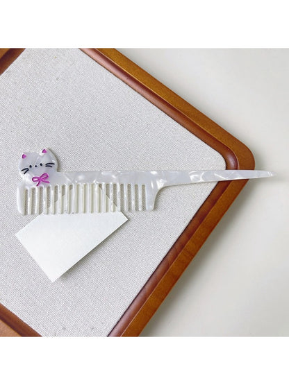 Camerow acetate hair comb displayed alongside hair styling accessories