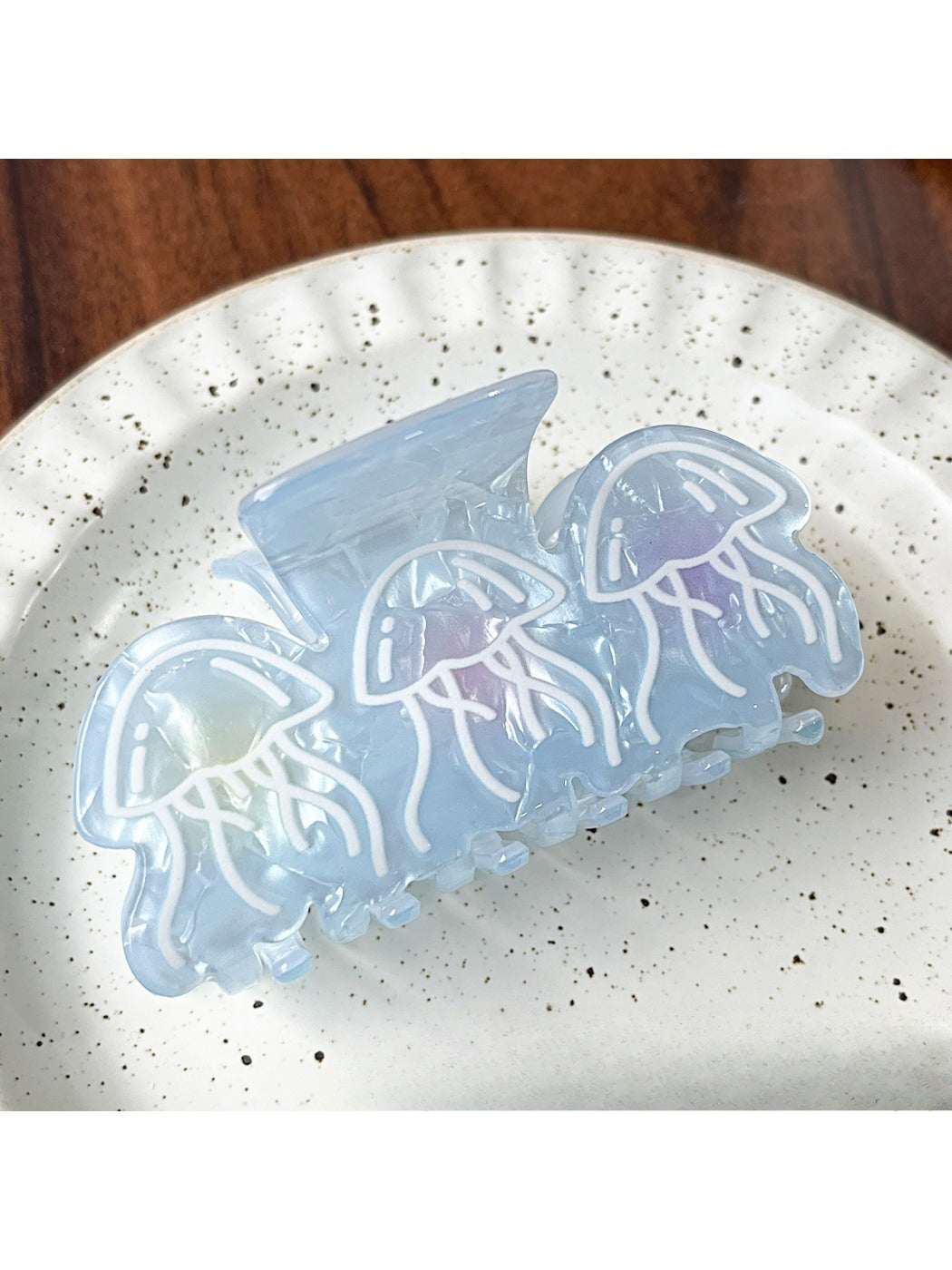 Top view of Beau gradient blue claw clip with smooth rounded design