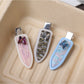 Close-up of Beau butterfly hair clip showing smooth acetate surface and oval shape