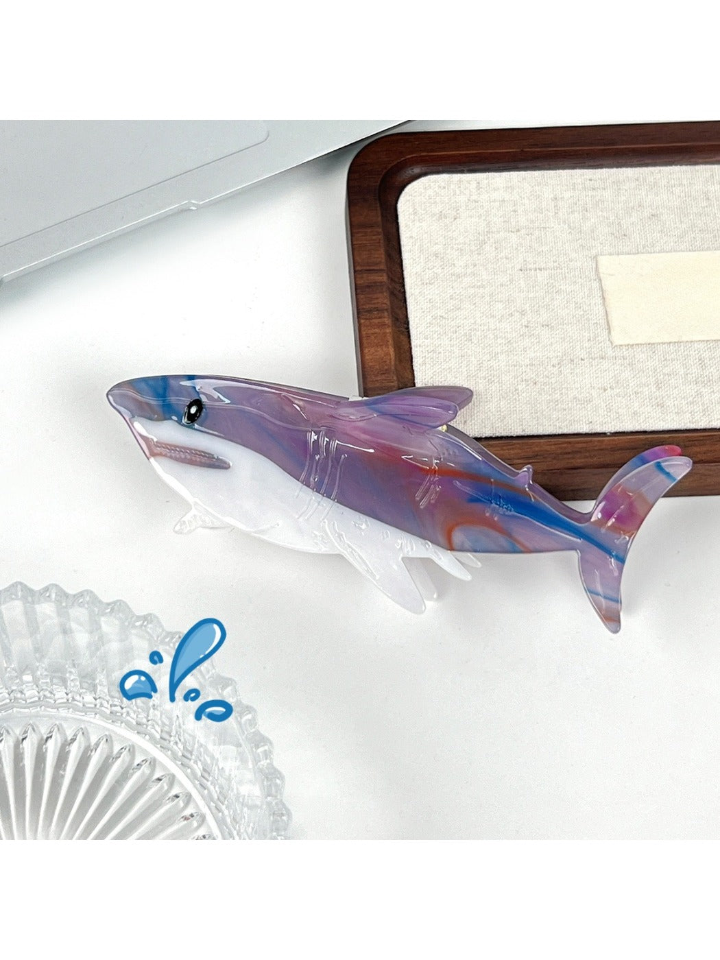 Beau shark hair claw clip shown from above with open jaws and teeth visible
