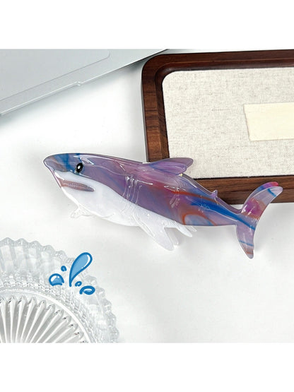 Beau shark hair claw clip shown from above with open jaws and teeth visible