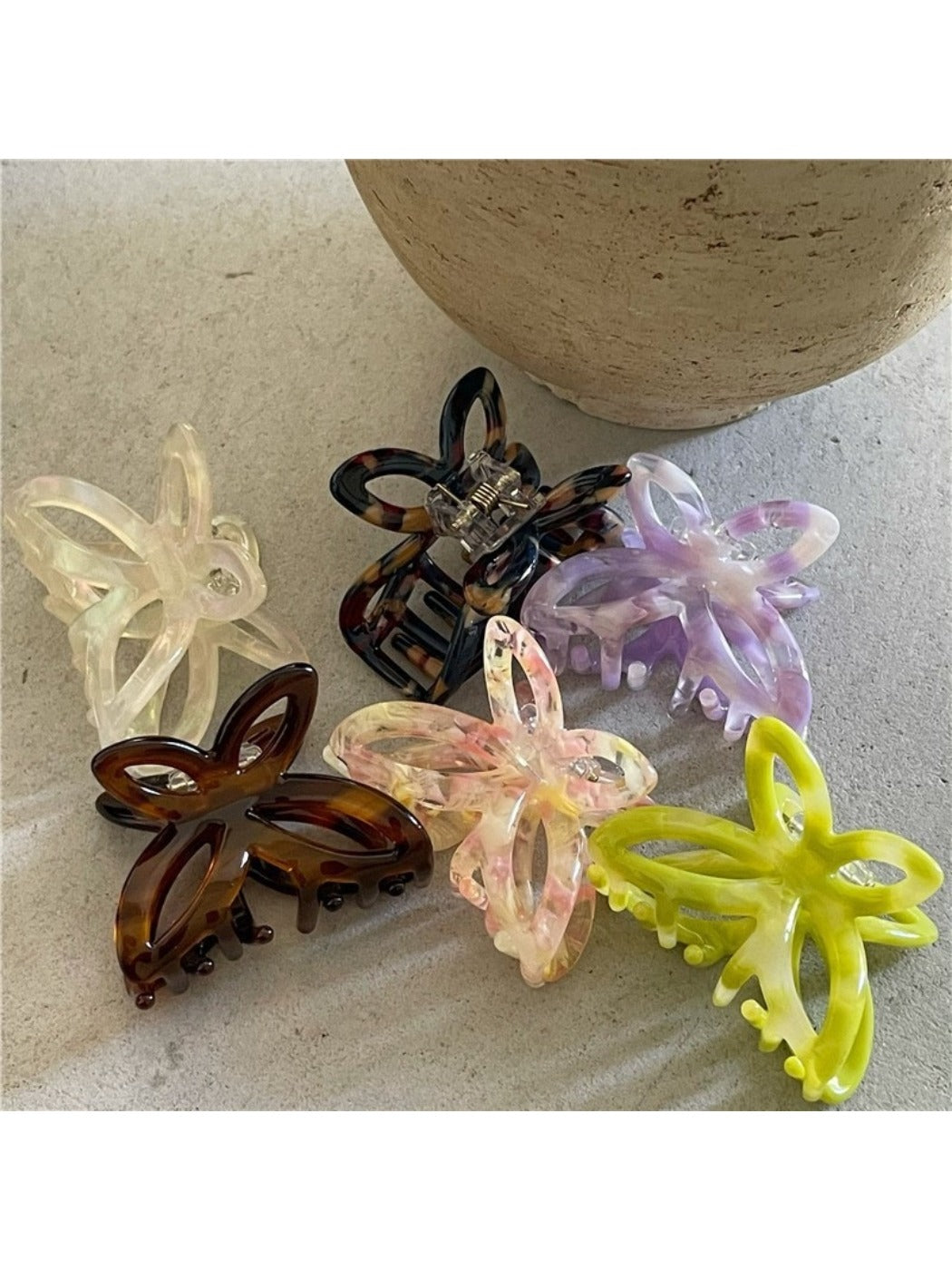 Close-up of Beau Misty Acetate Butterfly Hair Clip highlighting translucent acetate material