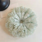 Mint green plaid tulle scrunchie with layered ruffles on a white background