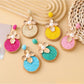 Close-up of Earedge chic circular floral drop earrings with gold-tone finish
