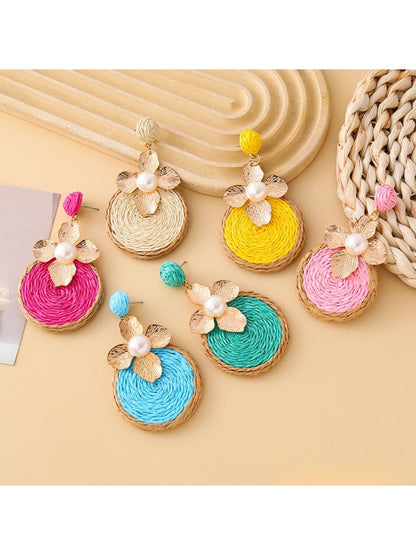 Close-up of Earedge chic circular floral drop earrings with gold-tone finish