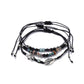 Lovra alloy charm small bead bracelet with clasp visible on a neutral background