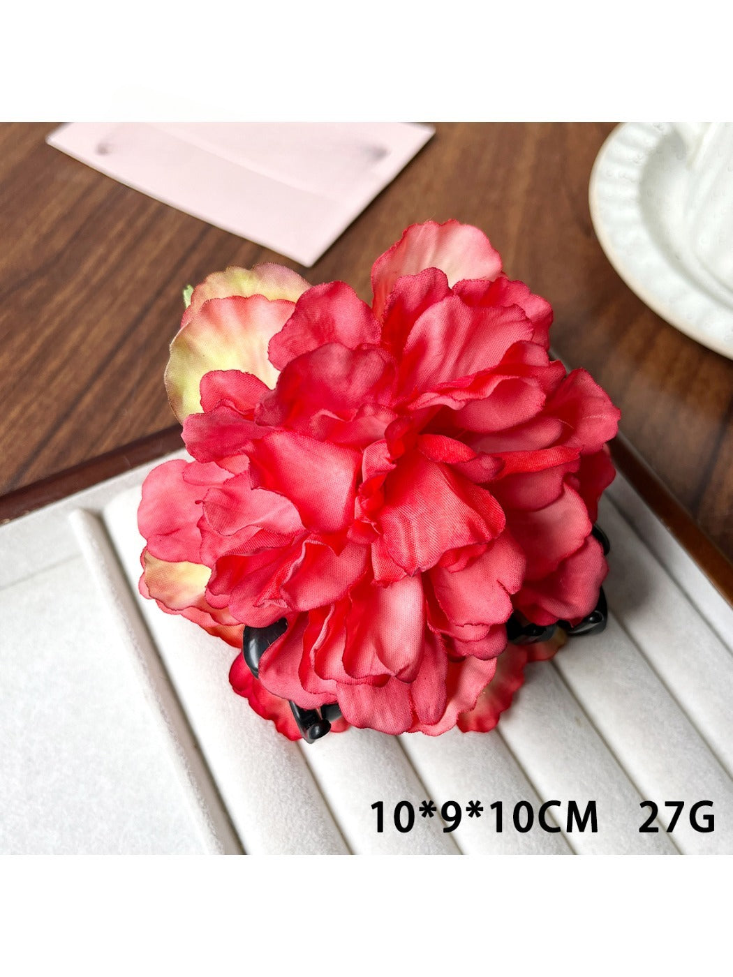 Beau peony flower claw clip held in hand showing size and flower detail