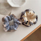 Gifty color block print ruffle scrunchie in pastel shades on white background