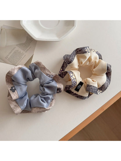 Gifty color block print ruffle scrunchie in pastel shades on white background