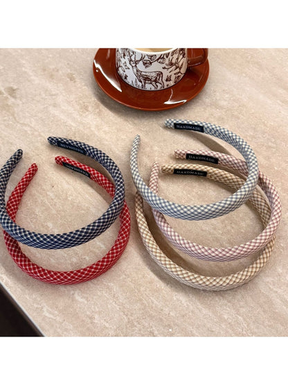 Side view of Gifty minimalist plaid headband highlighting its slim design
