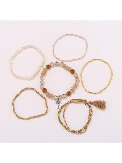 Close-up of Lovra boho bracelet showing detailed multi-colored beads and tassels