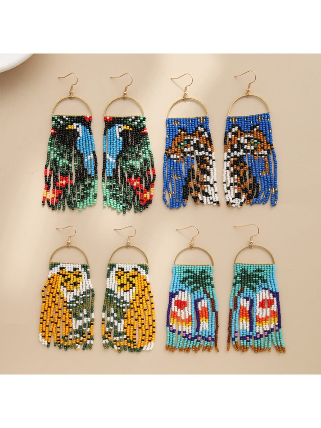 Earedge - Long Animal Shaped Tassel Earrings