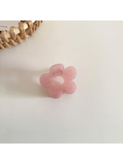 Beau hair clip worn in brown hair, showcasing size and natural look