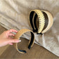 Gifty minimalist wide bohemian headband in neutral tones displayed on a white background