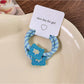 Gifty - Colorful Patterned Hair Ties - 2 Pack