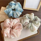 Gifty Chic dip dye scrunchie in pastel pink and blue on white background