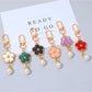 Colorful flower charm keychain with multiple vibrant petals on a silver keyring