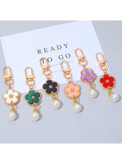 Colorful flower charm keychain with multiple vibrant petals on a silver keyring