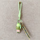 Multiple fabric animal keychains in different colors displayed together on a white background