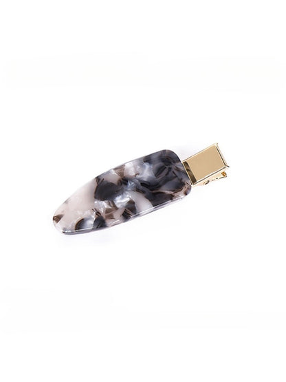 Beau vintage textured hair clip angled to show thickness and clasp detail