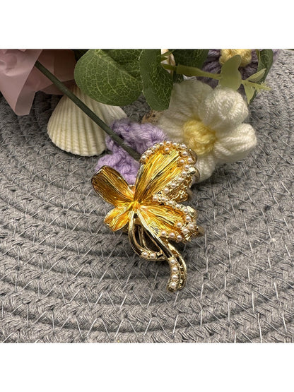 Close-up of Beau gentle flower hair clip showing layered pastel petals