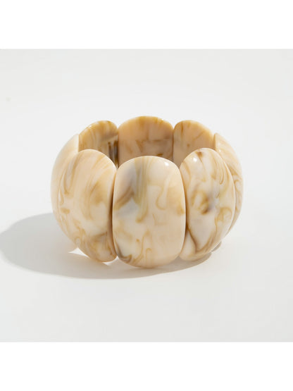 Lovra vintage textured link bracelet with clasp open on a flat surface